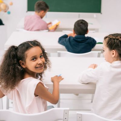 Multiracial students in a classroom.