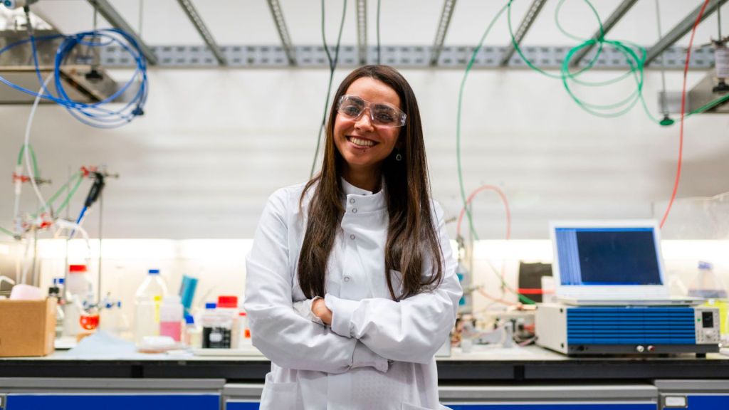 KInL - Supporting Women in STEM female engineer in front of her workspace