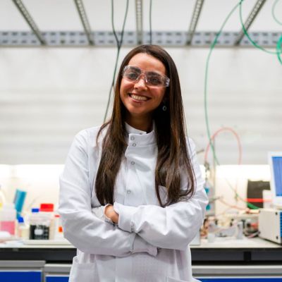 female engineer in front of her workspace