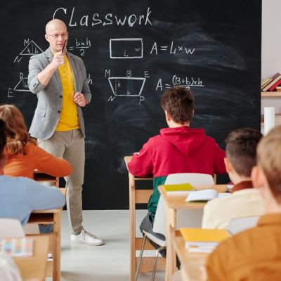 teacher teaching math in the classroom