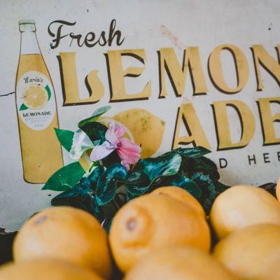 fresh lemonade sign with lemons