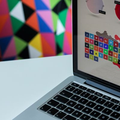 computer with icons and fun, bright background