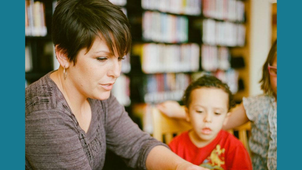 Librarian reading to students