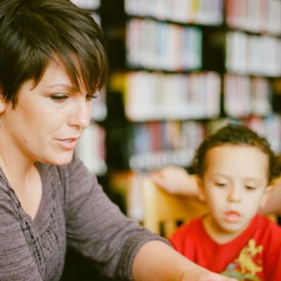 Librarian reading to students