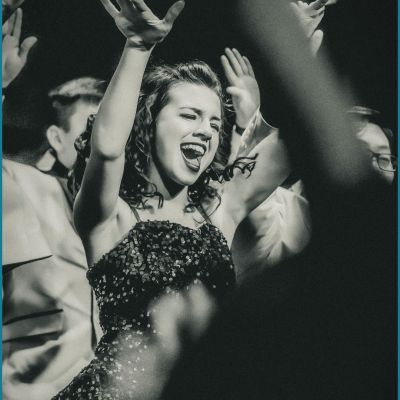 woman dancing in a crowd