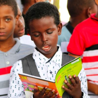 you black studen reading a book