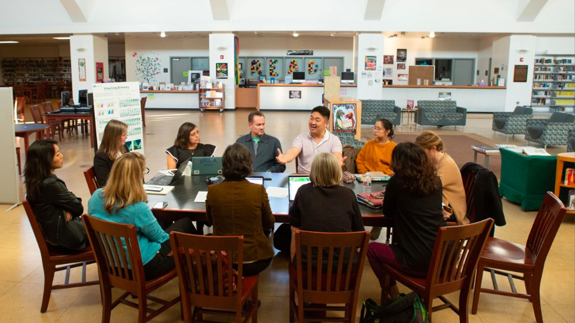 Edtech - Procurement Policies teachers meeting in a library