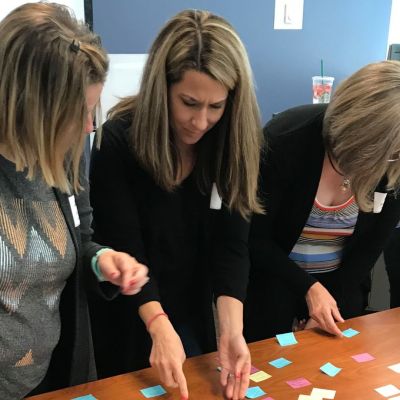 teachers working on a project together