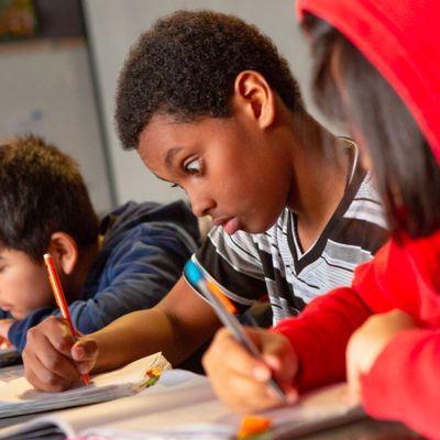 students writing together