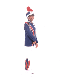 young Sharita Ware in a marching uniform