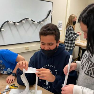 Students working on a paper STEM projects