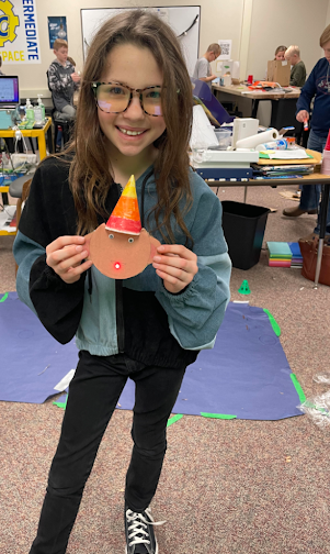 STEM Success student student holding project