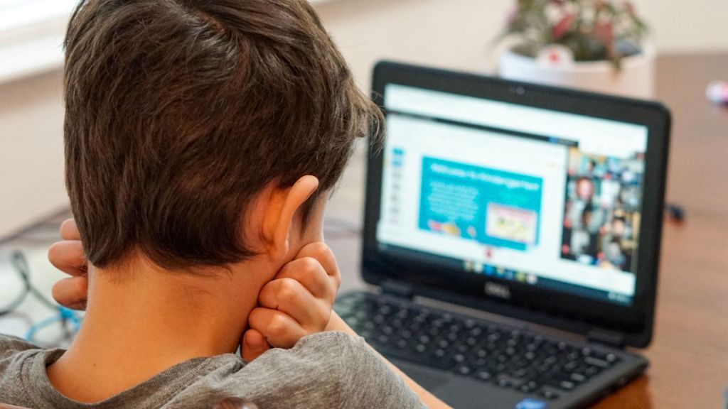 young student frustrated at computer