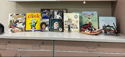 STEM classroom books books lined up on a countertop