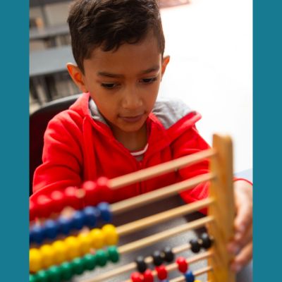 child working with an abacus