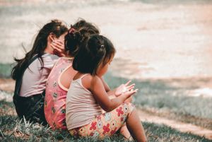 Children sitting together.