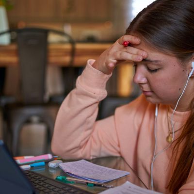 Student listening to music while working.