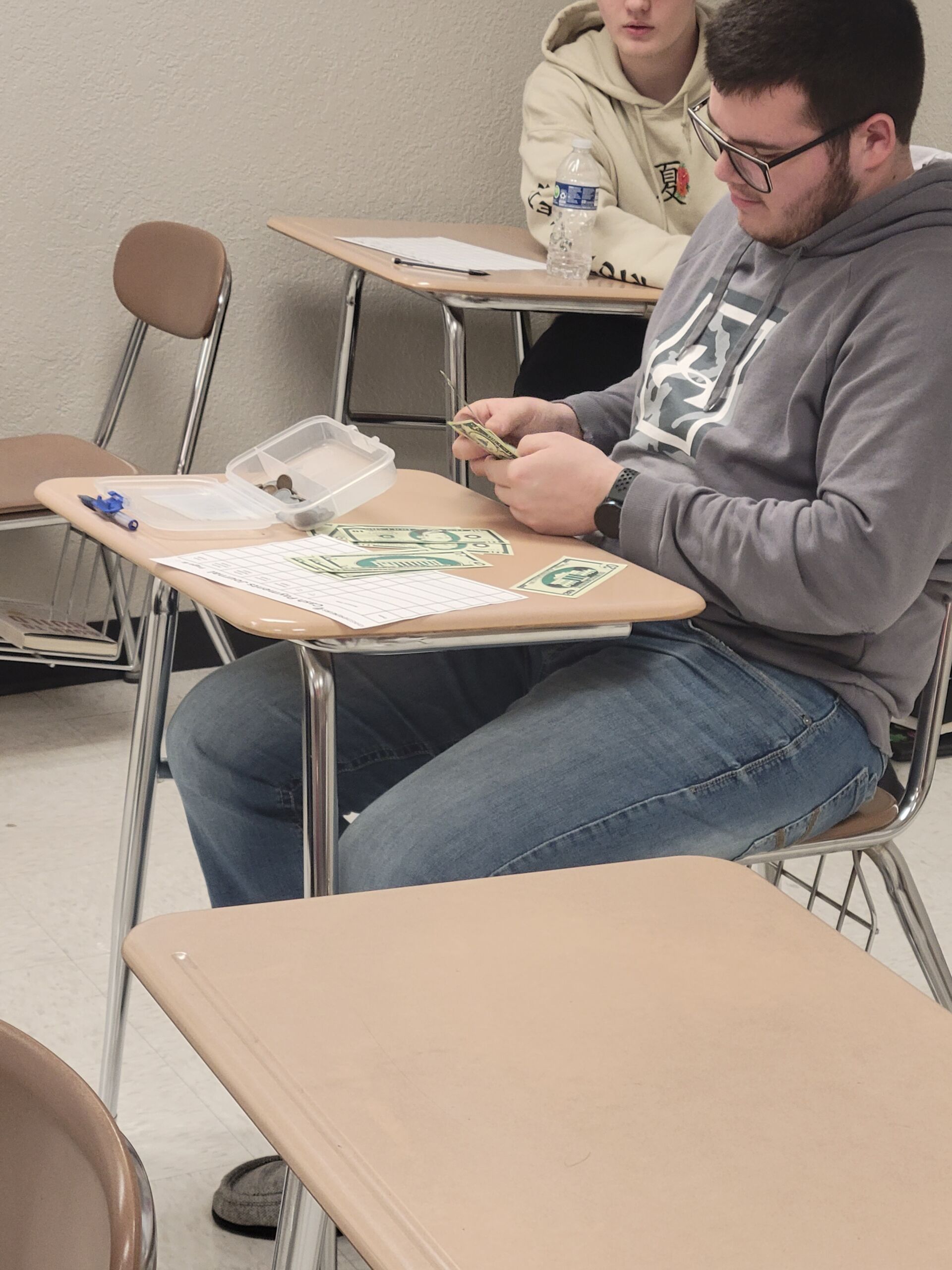 Copy of 20230113_114644 Student going through Petty Cash exercise.