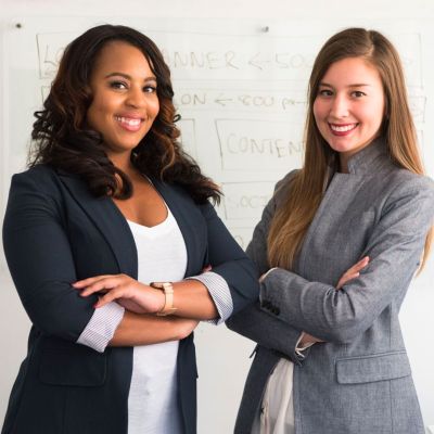 Two women posing for a picture.