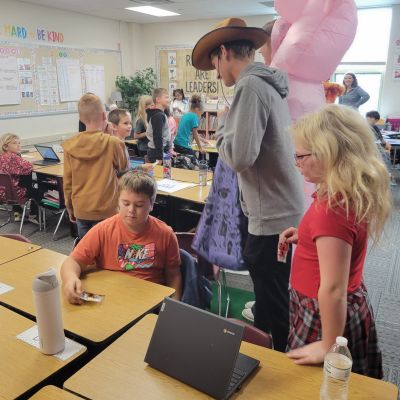 Students doing Reverse Trick or Treating.