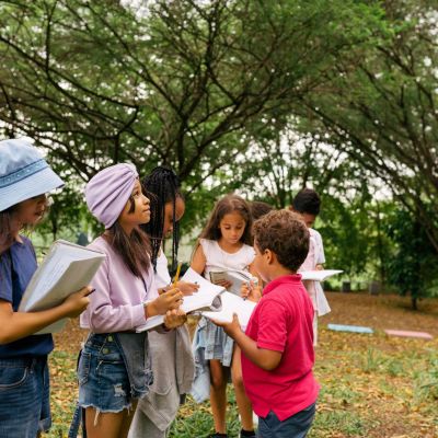 Students outside with books.