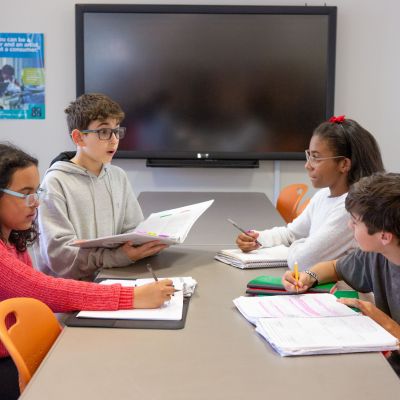 Students from Sutton Middle School’s debate team practice for an upcoming competition.
