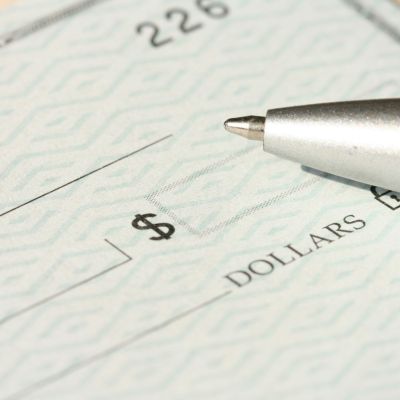A check and a pen.
