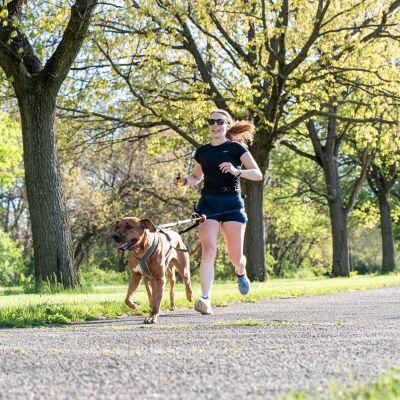 Woman and dog running. Photo Courtesy of the Author.