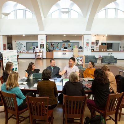 Teachers and staff from UCLA Community School meet with UCLA professors to discuss the various research projects happening at the school.