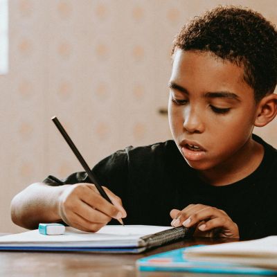 Boy doing homework.
