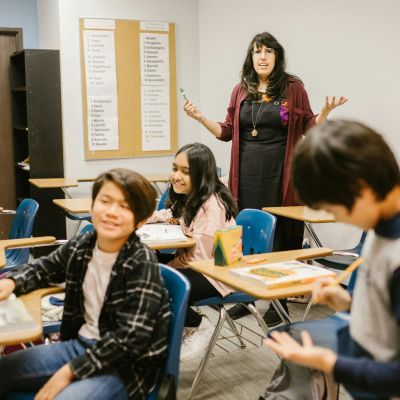 Teacher speaking to her students.