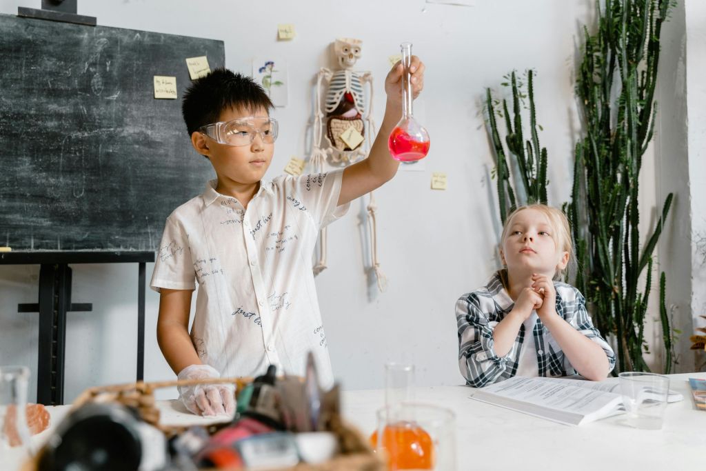 Two students doing science!