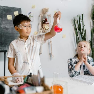 Two students doing science!