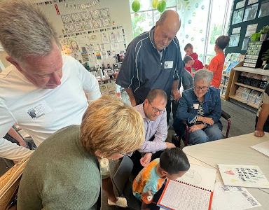 Grandparents in classroom with students.