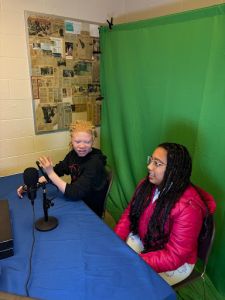 Students in front of a Green Screen.