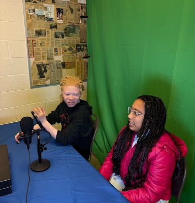 Students in front of a Green Screen.