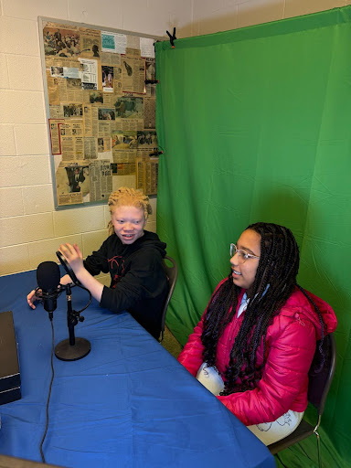 Students in front of a Green Screen.