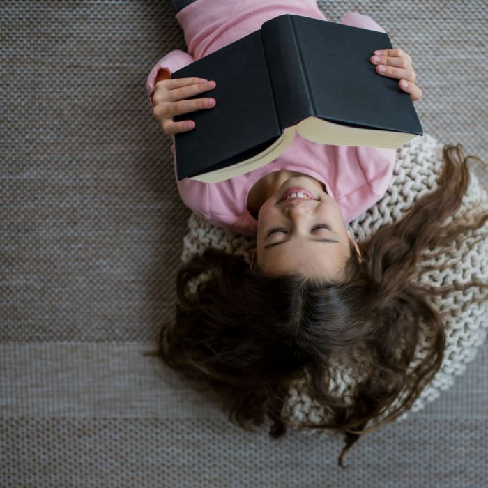 Child reading image by Getty Images for Unsplash+